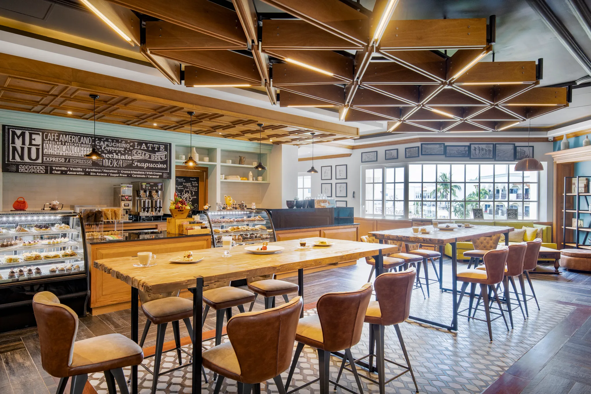 Aromas café at Hyatt Vivid Playa del Carmen featuring specialty coffee, fresh pastries, and a cozy contemporary café atmosphere.