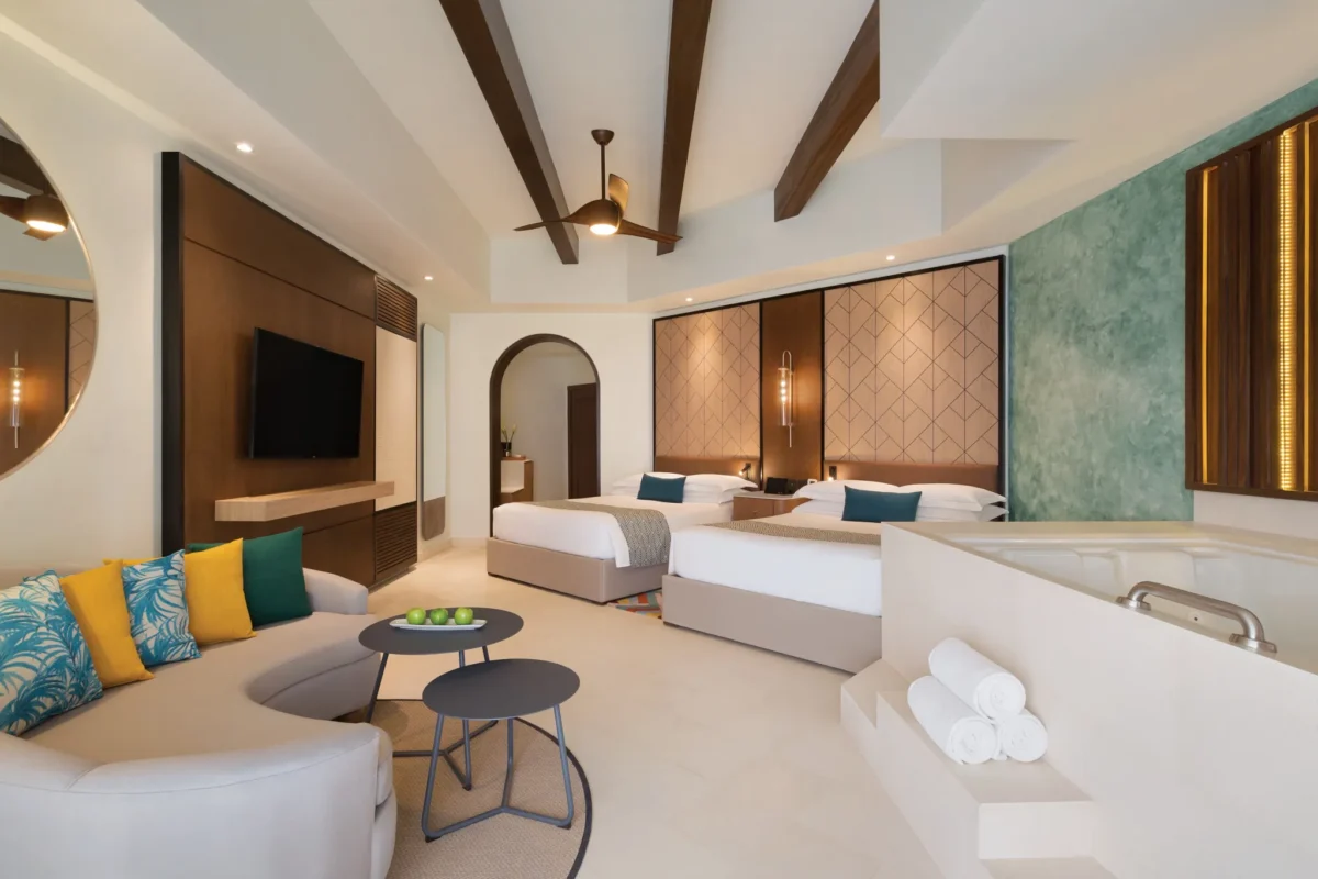 Junior Suite Garden View with two queen beds and indoor jetted tub at Hyatt Vivid Playa del Carmen.