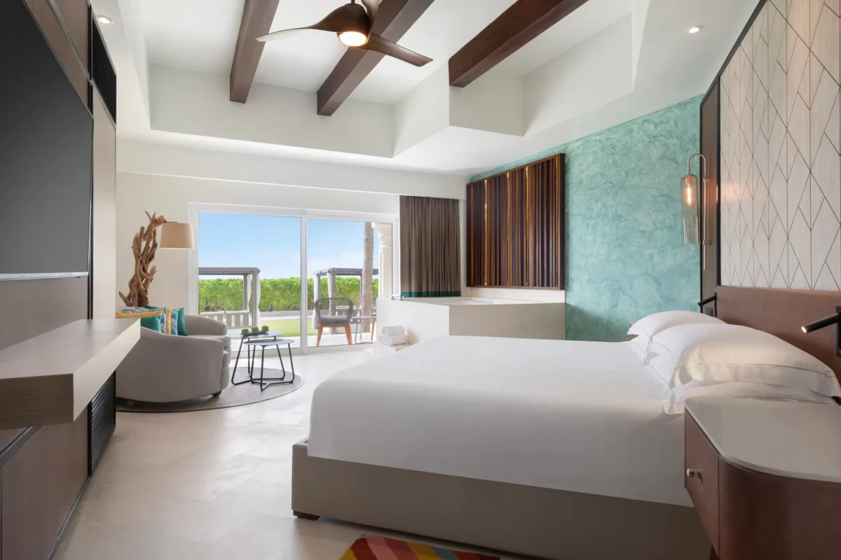 Junior Suite Ocean View with king bed, private balcony, and jetted tub at Hyatt Vivid Playa del Carmen.
