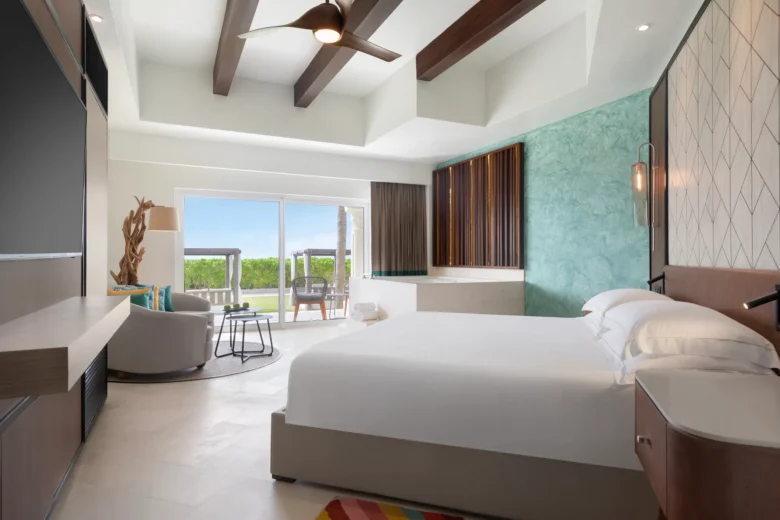Junior Suite Ocean View with king bed, private balcony, and jetted tub at Hyatt Vivid Playa del Carmen.