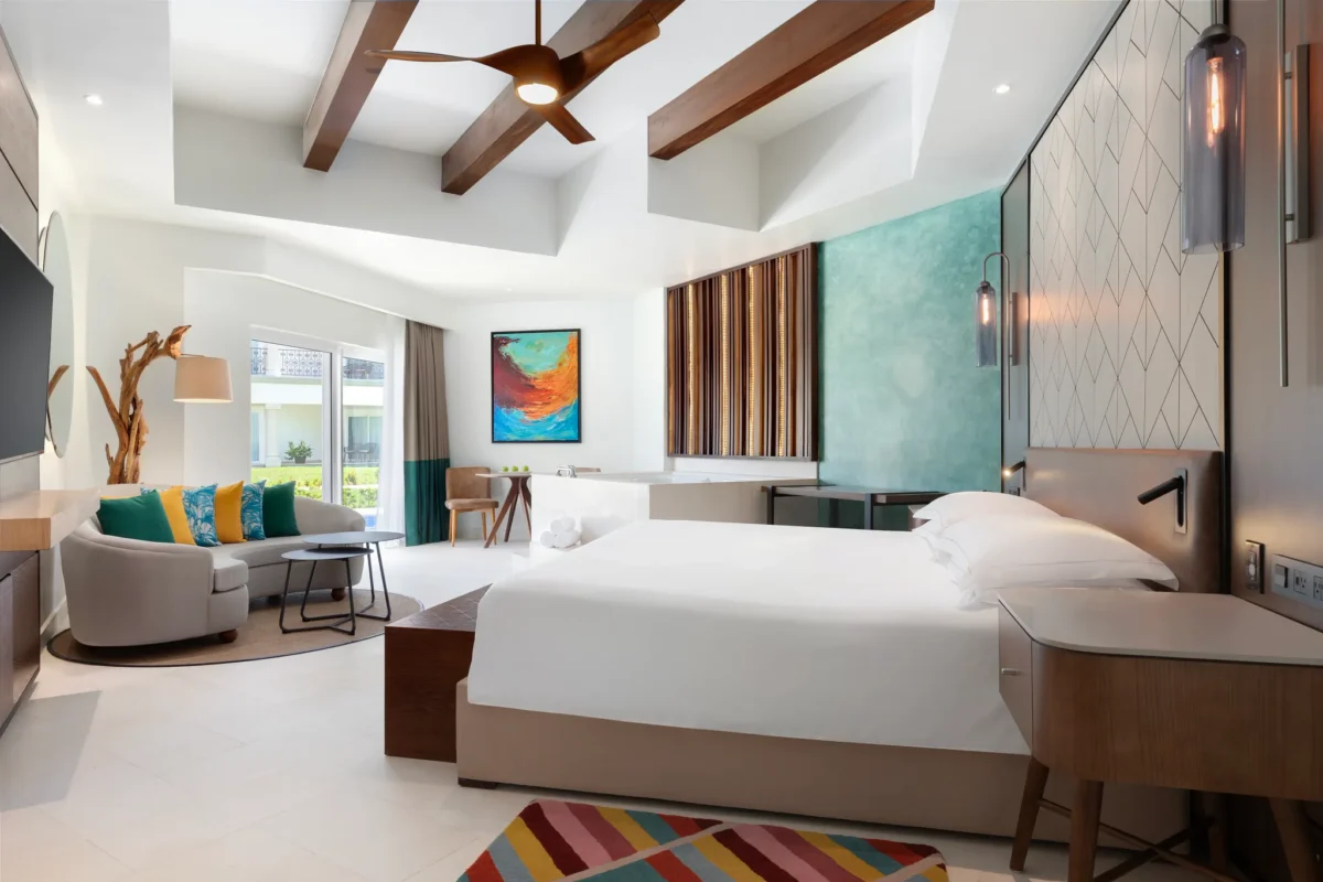 Junior Suite Swim-Up with king bed and jetted tub at Hyatt Vivid Playa del Carmen.