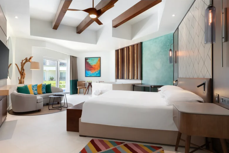 Junior Suite Swim-Up with king bed and jetted tub at Hyatt Vivid Playa del Carmen.