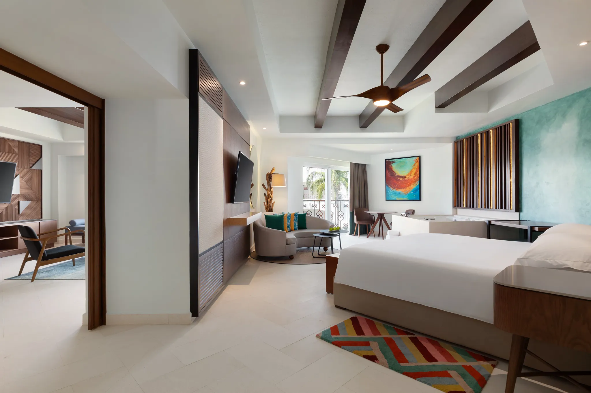 One Bedroom Suite King with spacious bedroom and living area at Hyatt Vivid Playa del Carmen.