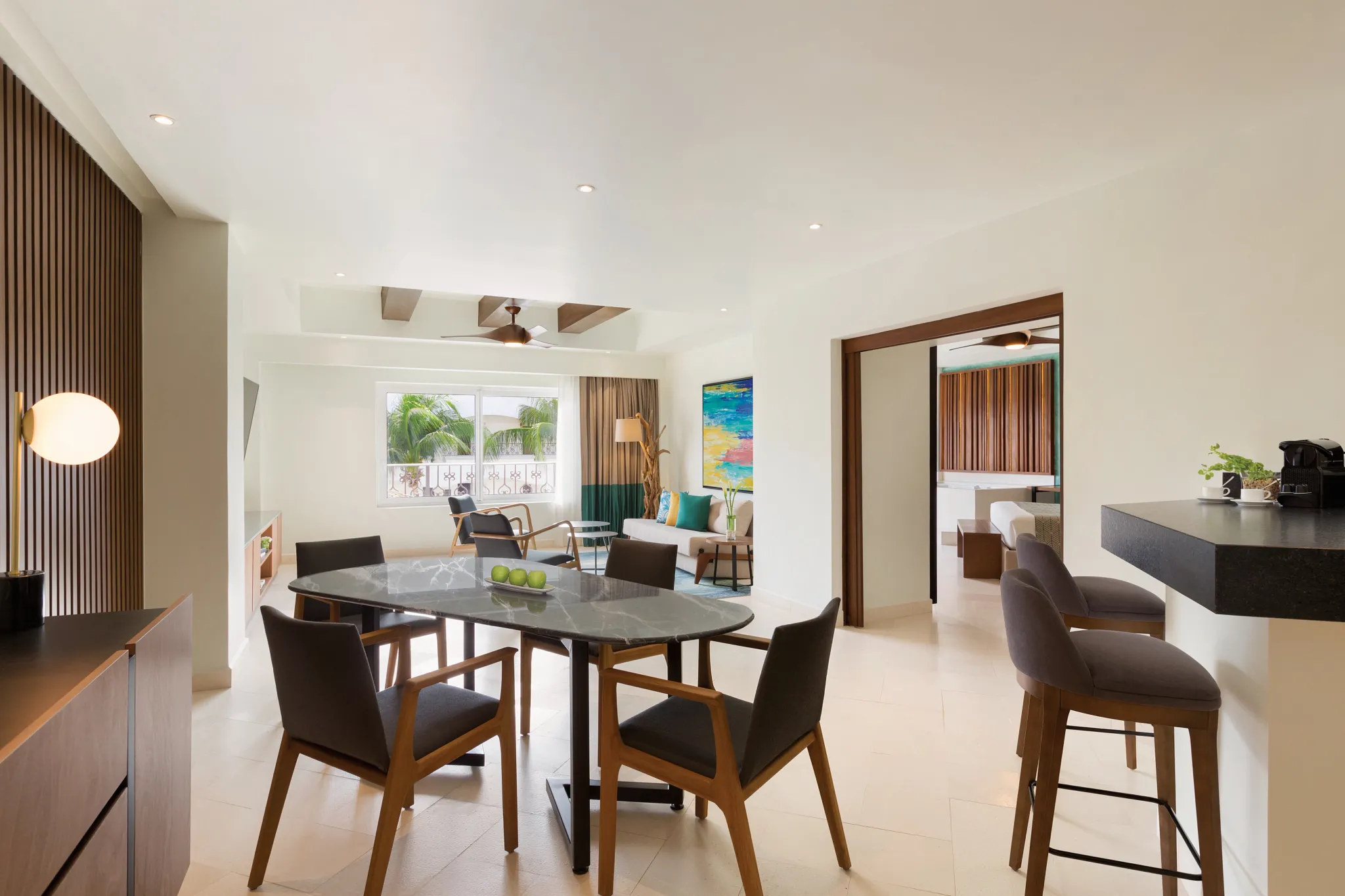 One Bedroom Suite King living area with lounge seating at Hyatt Vivid Playa del Carmen.