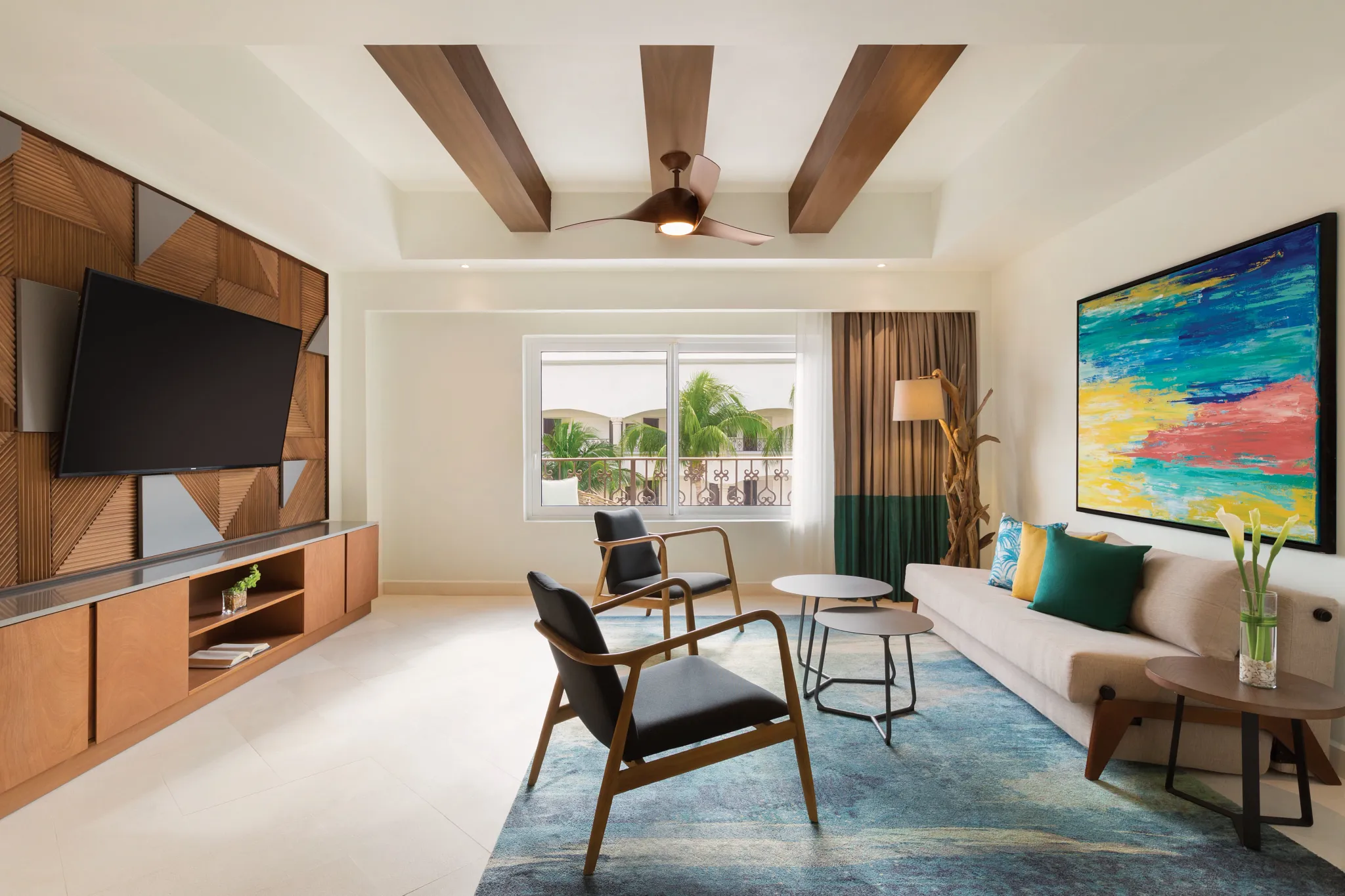 One Bedroom Suite King sitting area with dining space at Hyatt Vivid Playa del Carmen.